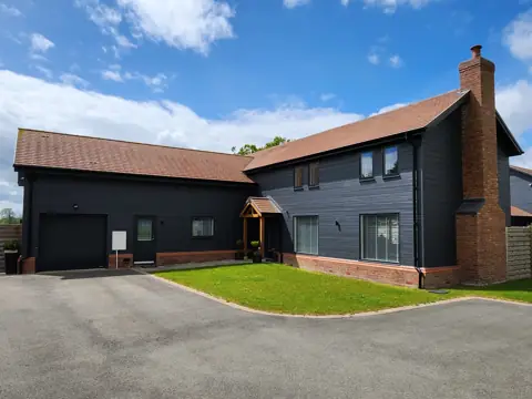Cladding around the house and garage — CG Cladding Solutions