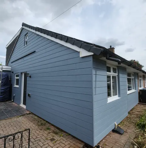 Pale cladding on a small extension — CG Cladding Solutions